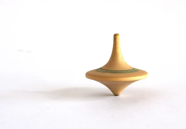 Old wooden spinning top — Stock Photo, Image