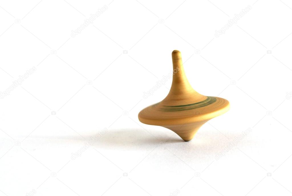 Old wooden spinning top