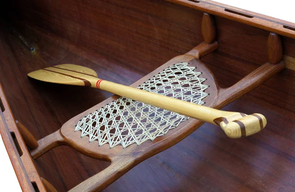 Wooden paddle inside a boat — Stock Photo, Image