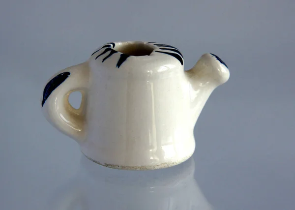 Miniature of porcelain watering can — Stock Photo, Image