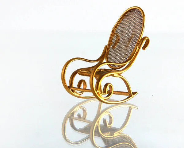 Vintage brass schommelstoel — Stockfoto