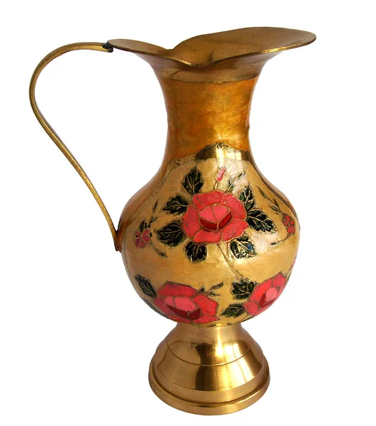Antique brass jug with a flower pattern — Stock Photo, Image