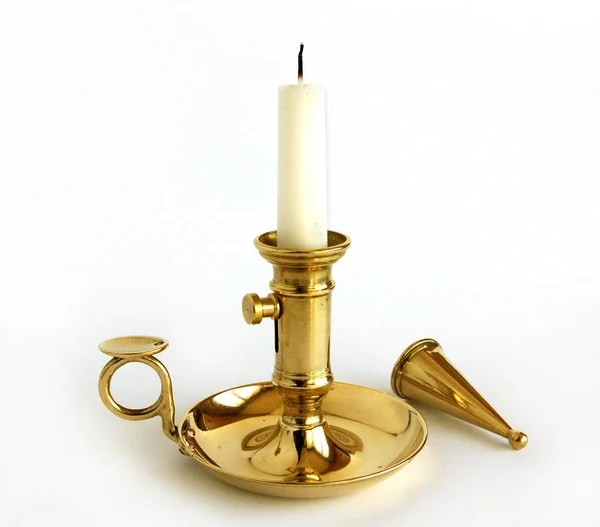 Brass candlestick with snuffer — Stock Photo, Image