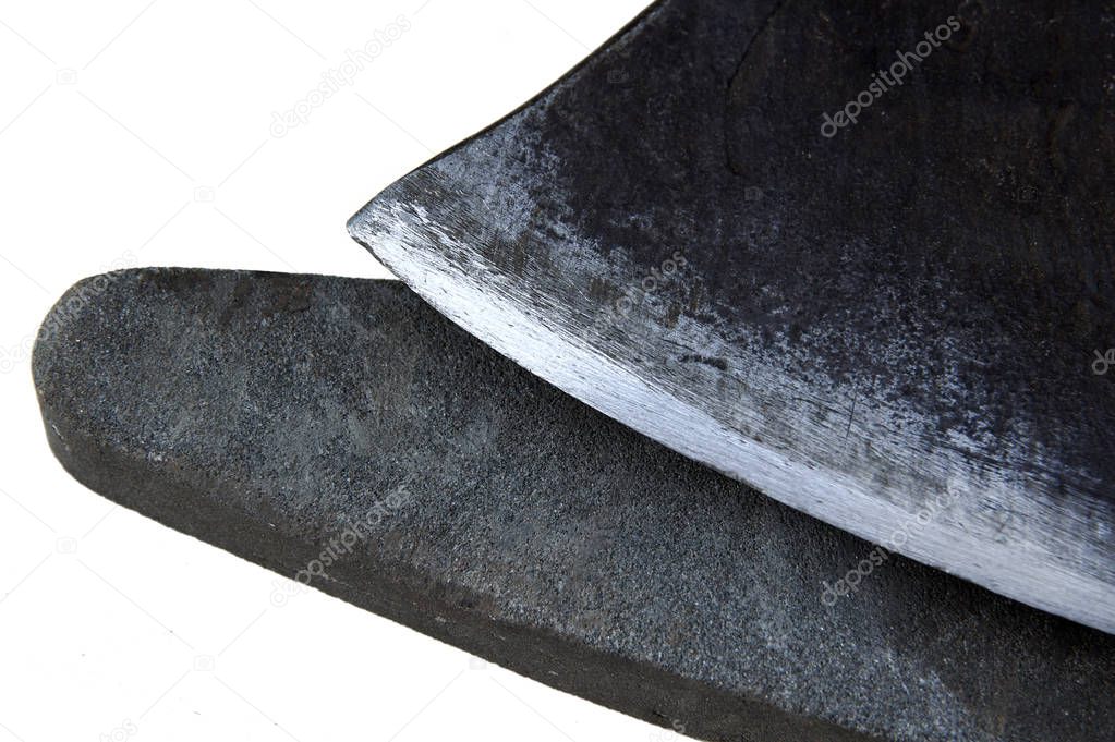  stone and a blade of an ax