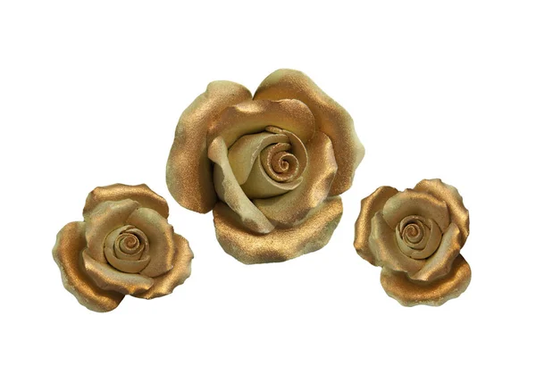 Фарфоровые позолоченные розы — стоковое фото