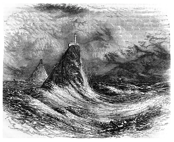 Маяк в море во время шторма — стоковое фото