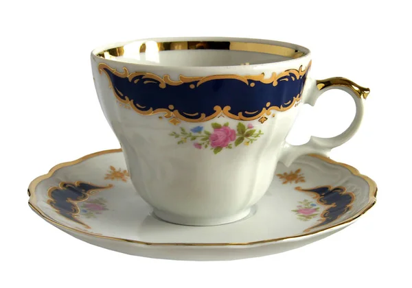 Coupe et soucoupe en porcelaine antique — Photo