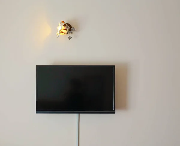 Zwarte Led televisiescherm hangen aan de muur — Stockfoto