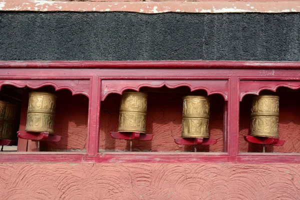 Tibetan prayer wheels or prayer\'s rolls of the faithful Buddhists in Ladakh, India. Ladakh is the highest plateau in the state of Jammu & Kashmir with much of it being over 3,000m.