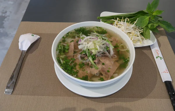 Traditional Vietnamese noodle soups (Pho Bo) — ストック写真