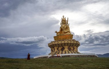 Big Buddha on the hill at Yarchen Gar Monastery