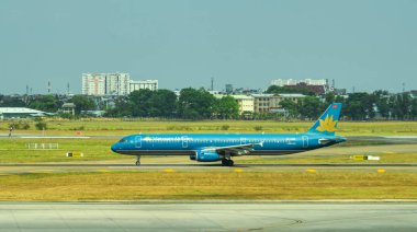 Saygon, Vietnam - 28 Ocak 2020. VN-A395 Vietnam Havayolları Airbus A321 Saigon 'da Tan Son Nhat Havaalanı' nın (SGN) pistinde taksicilik yapıyor.).