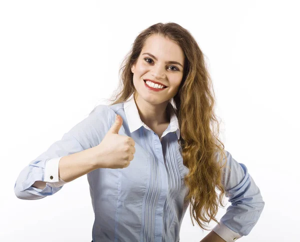 Portrait of a beautiful smiling young woman dressed in a blue sh — Stock Photo, Image