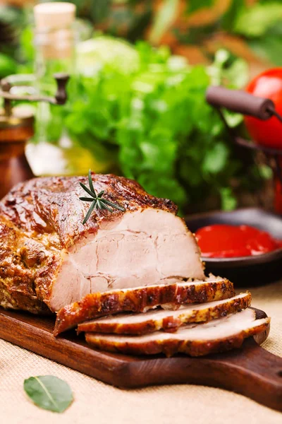 Roast pork with tomato dip and herbs. — Stock Photo, Image