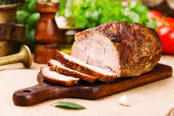 Roast pork with herbs and vegetables. — Stock Photo, Image
