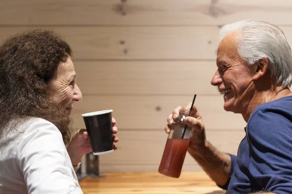 Couple drinking  in a bar Stock Photo