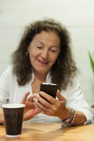 Woman using cellplhone Stock Image