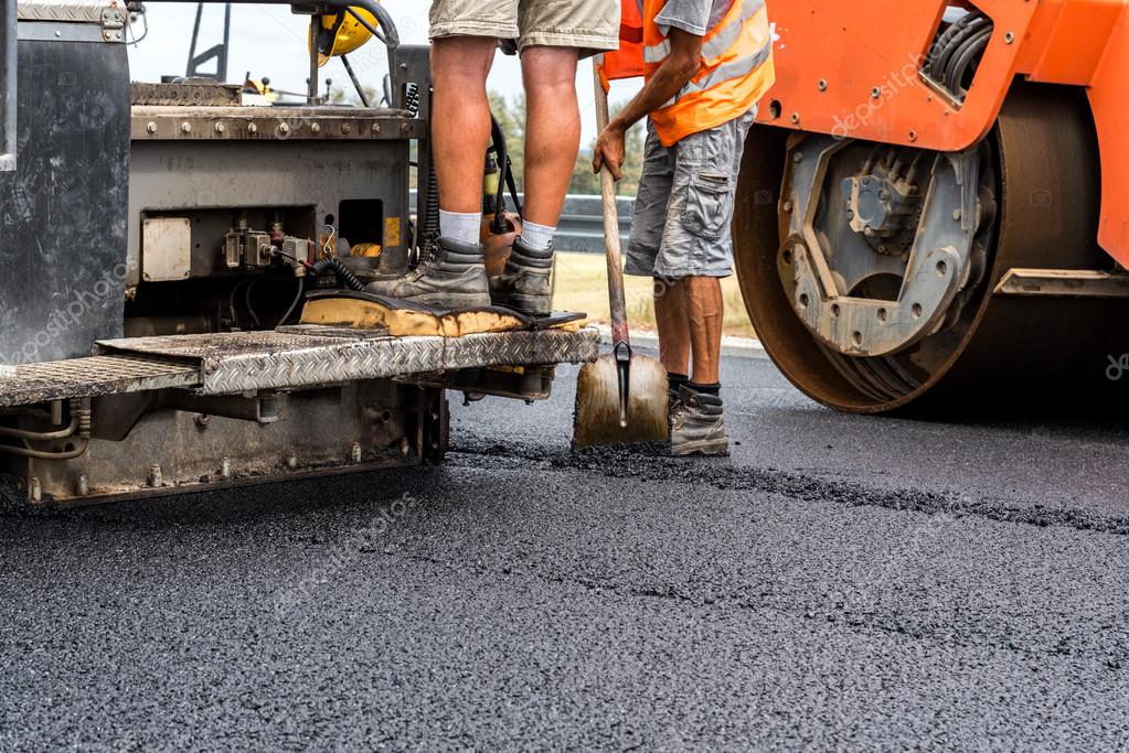 Close view on the workers on the construction site