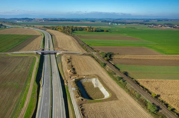 Nieuwe weg bouw site luchtfoto — Stockfoto