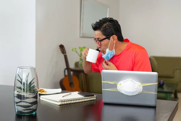 Man Lowers His Coffee Mask While Working Home Due Covid — Stock Photo, Image