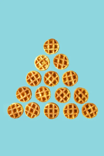 Flying Foods Pyramid Pile Small Waffles Isolated Trendy Blue Background — Stock Photo, Image