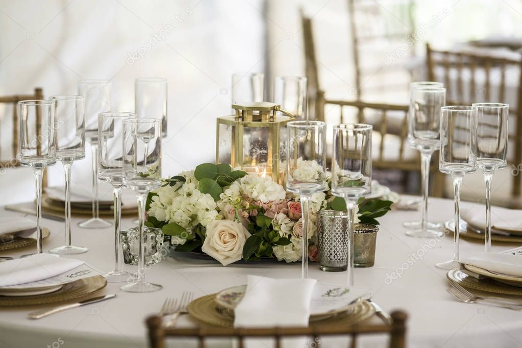Table set up for wedding reception in tent