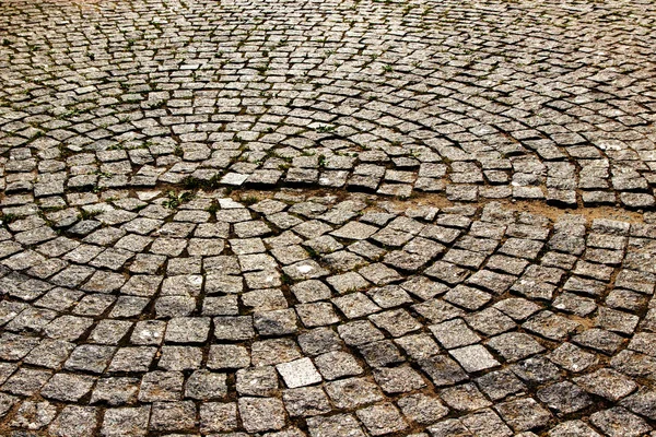 Каменная текстура дороги, выложенная по кругу — стоковое фото