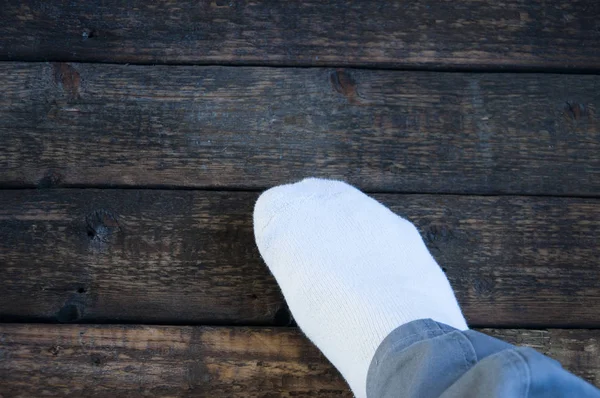 Leg White Sock Wooden Background Wood Texture — Stock Photo, Image