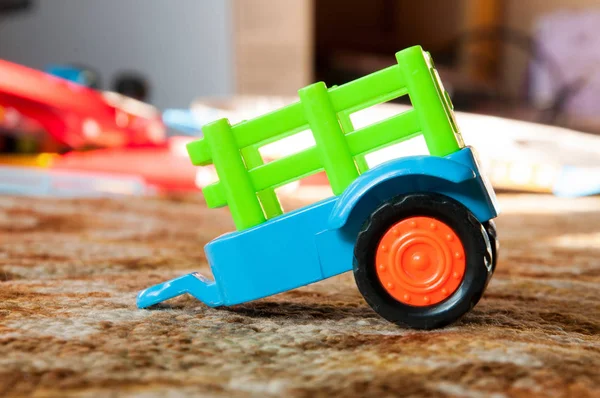 Children\'s plastic toy. Trailer for a car.