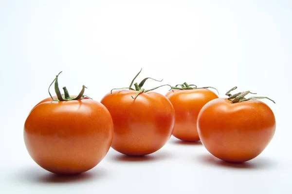 Tomates Frescos Vermelho Com Uma Espinha Verde Comida Vegetariana Fundo — Fotografia de Stock