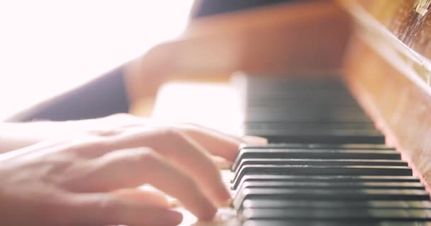 Girl playing on piano 4K — Stock Video