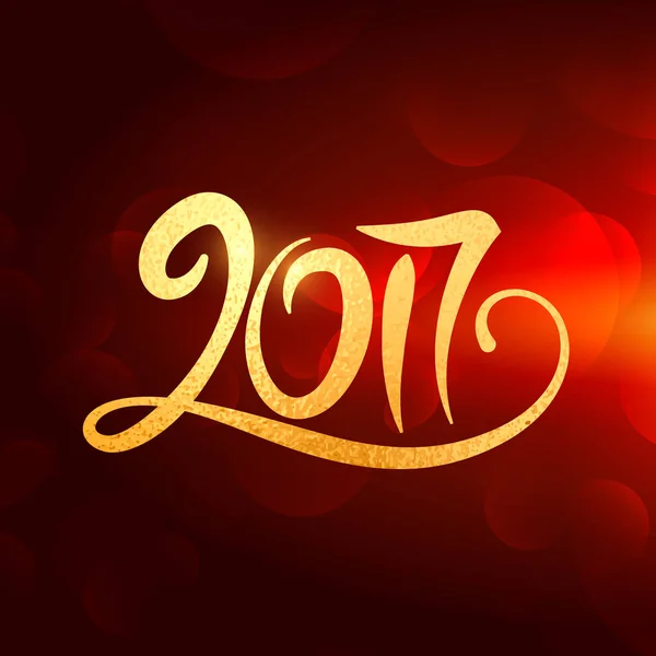 2017 new year lettering in gold color on red background