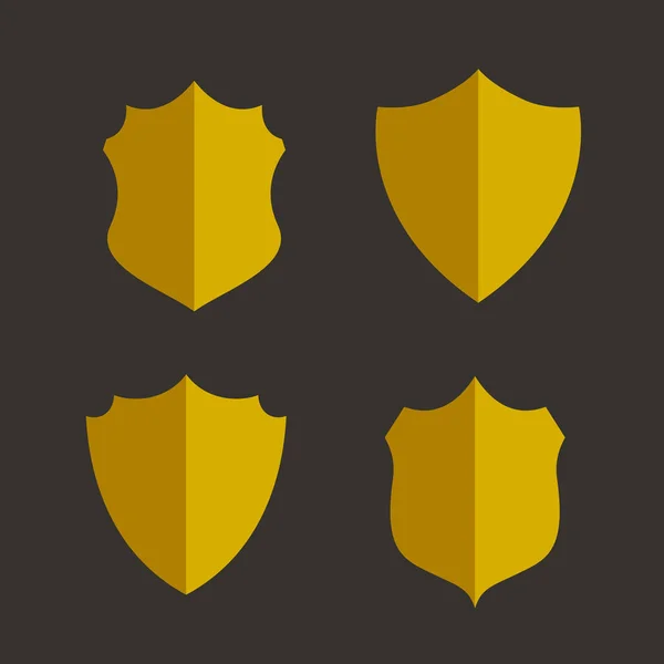 Four golden badges and labels design set — Stock Vector