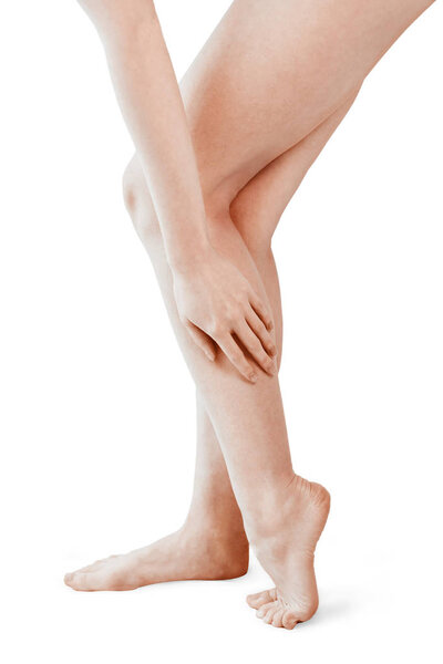 Isolated woman legs being massaged