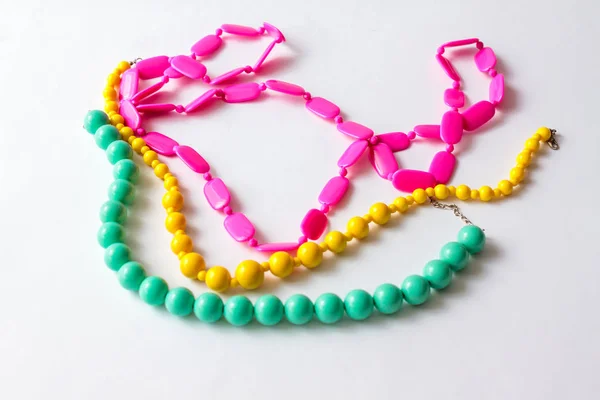Beaded necklace from colorful beads in the white background — Stock Photo, Image