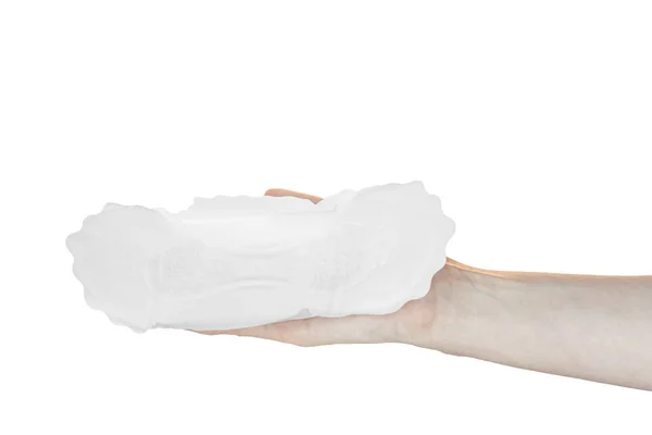 Conceito de saúde. Nova almofada de guardanapo sanitário na mão da mulher isolada no espaço de cópia branca — Fotografia de Stock