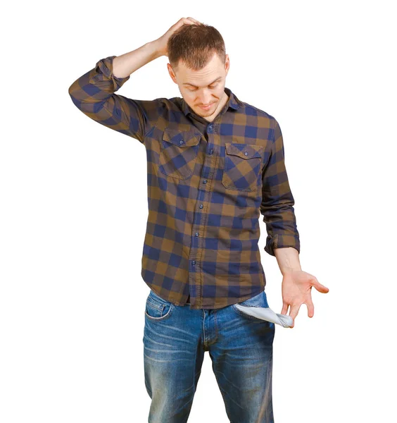 Man in a checkered shirt , holding his head showing empty pockets, sad unhappy face expression. Isolated on white background — Stock Photo, Image