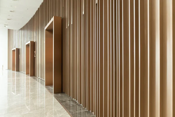 Detail of Random wooden strip wall in vertical direction at pre-function space / interior / natural light — Stock Photo, Image