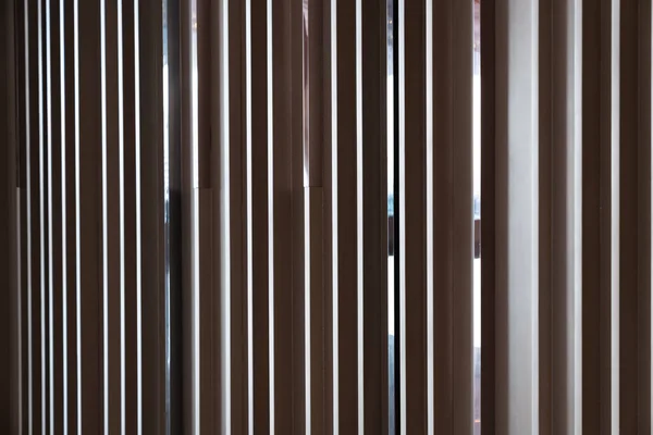 Detail of Random wooden strip with stainless steel trim in mirror finished wall in vertical direction / interior design / detail design — Stock Photo, Image