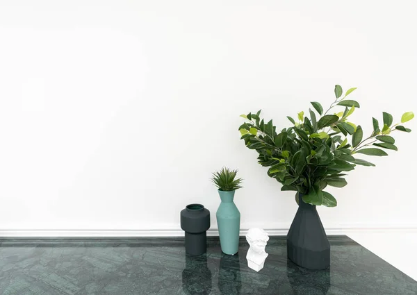 Living roon corner decorated with black matt ceramic  vase and artificial plant in vase on green marble top with white spray-painted wall in the background /apartment interior /object on white background — Stock Photo, Image