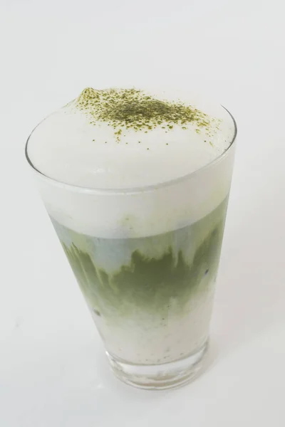 Matcha green tea,japanese drinking, in a glass of cold, refreshing ice, isolated on white background