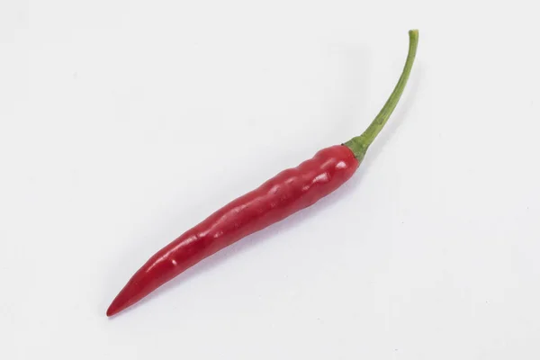 Närbild Ovanifrån Röd Chilipeppar Vit Bakgrund Raw Food Ingrediens Koncept — Stockfoto