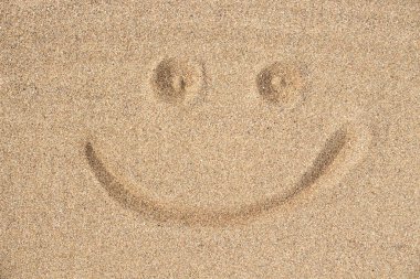 The smile on the sea sand