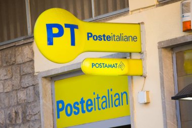 Castelmola, SICILY, ITALY - SEPTEMBER 28, 2019: Italy Post logo and postamat sign in the tourist old town of Castelmola