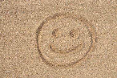 The smile on the sea sand
