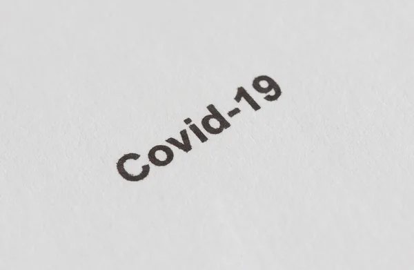 Schwarze Inschrift Coronavirus Covid Auf Papier Makromodus — Stockfoto
