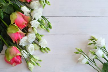 Valentine card.Template greeting card for Valentine's Day with white eustomas and pink roses. Spring card for Mother's Day, Women's Day. Copy space. Congratulations on wedding or anniversary. March 8