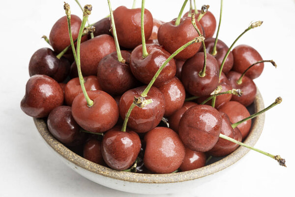 Fresh Cherries In A Small Round Bowl
