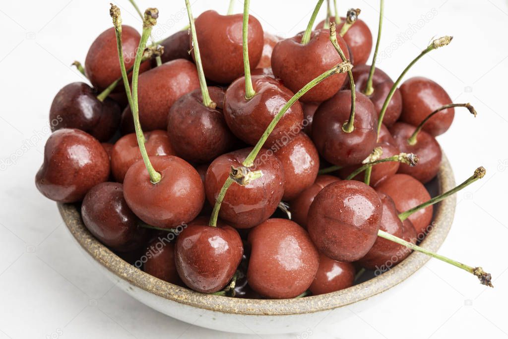 Fresh Cherries In A Small Round Bowl