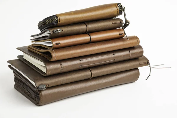 A Stack of Leather-Bound Journals, Notebooks, Wallets & Cases — стоковое фото